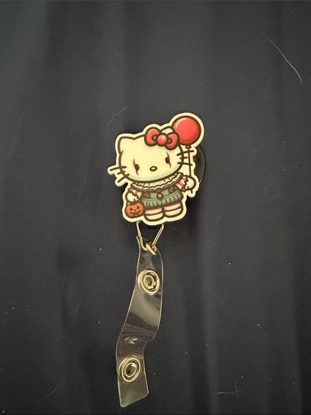 Hello Kitty Badge Reel with Red Balloon and Cream Character